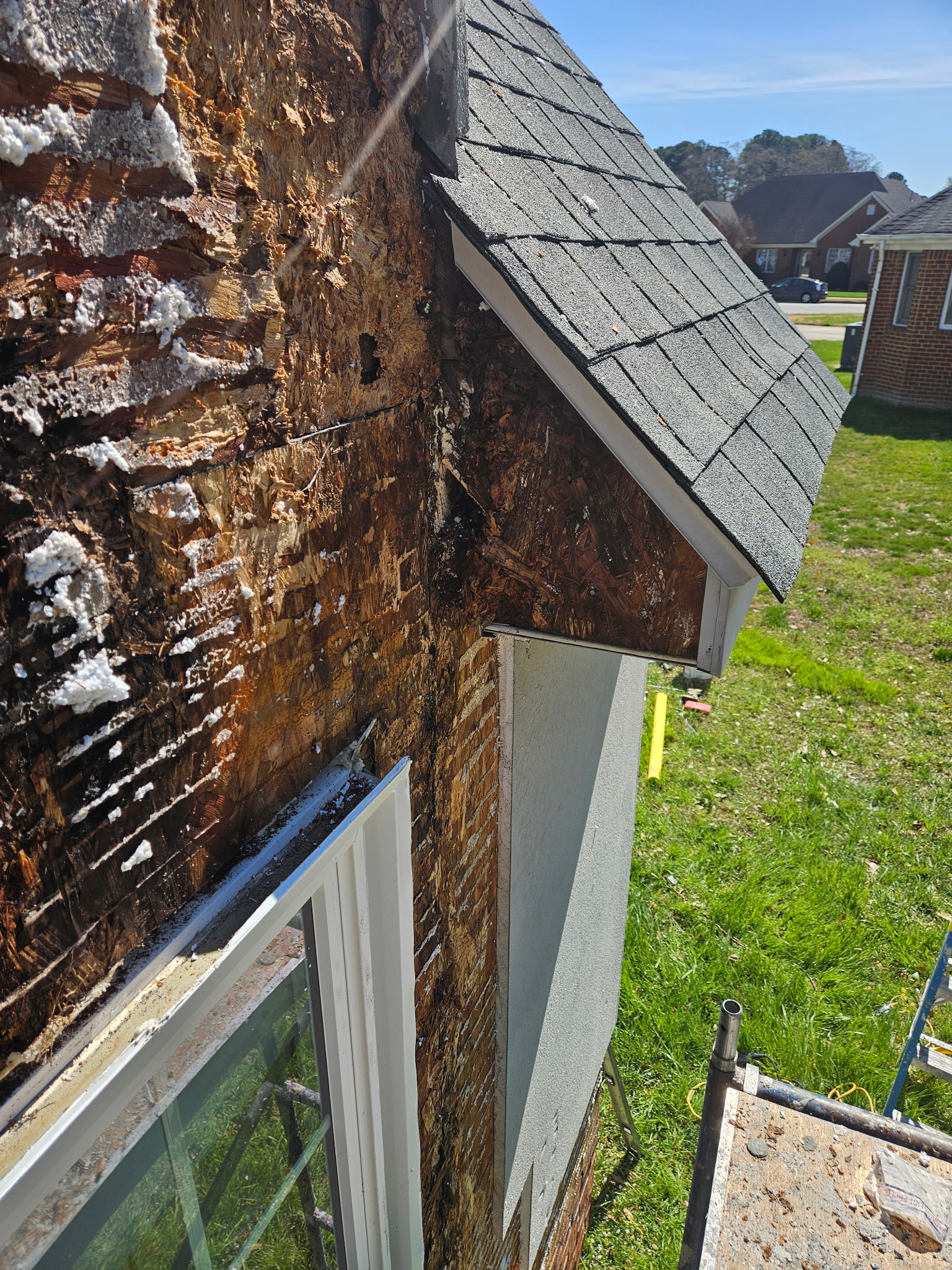 Moisture-damaged substrate at a wall corner behind EIFS