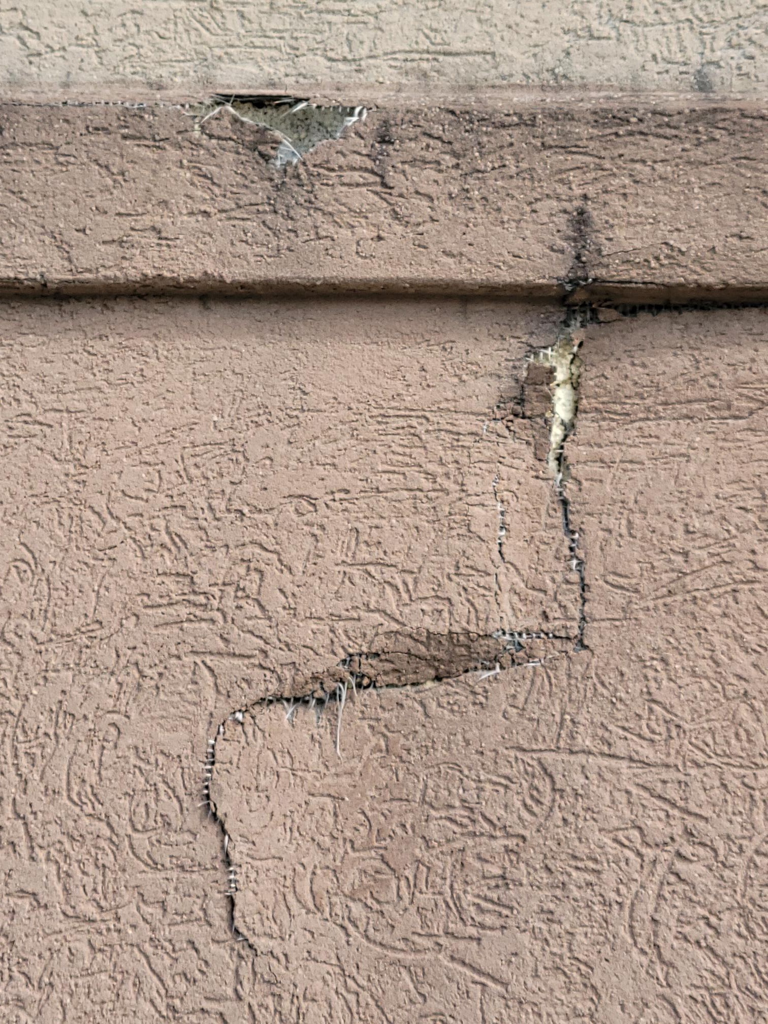Cracked EIFS finish letting water into the wall, Hampton Roads