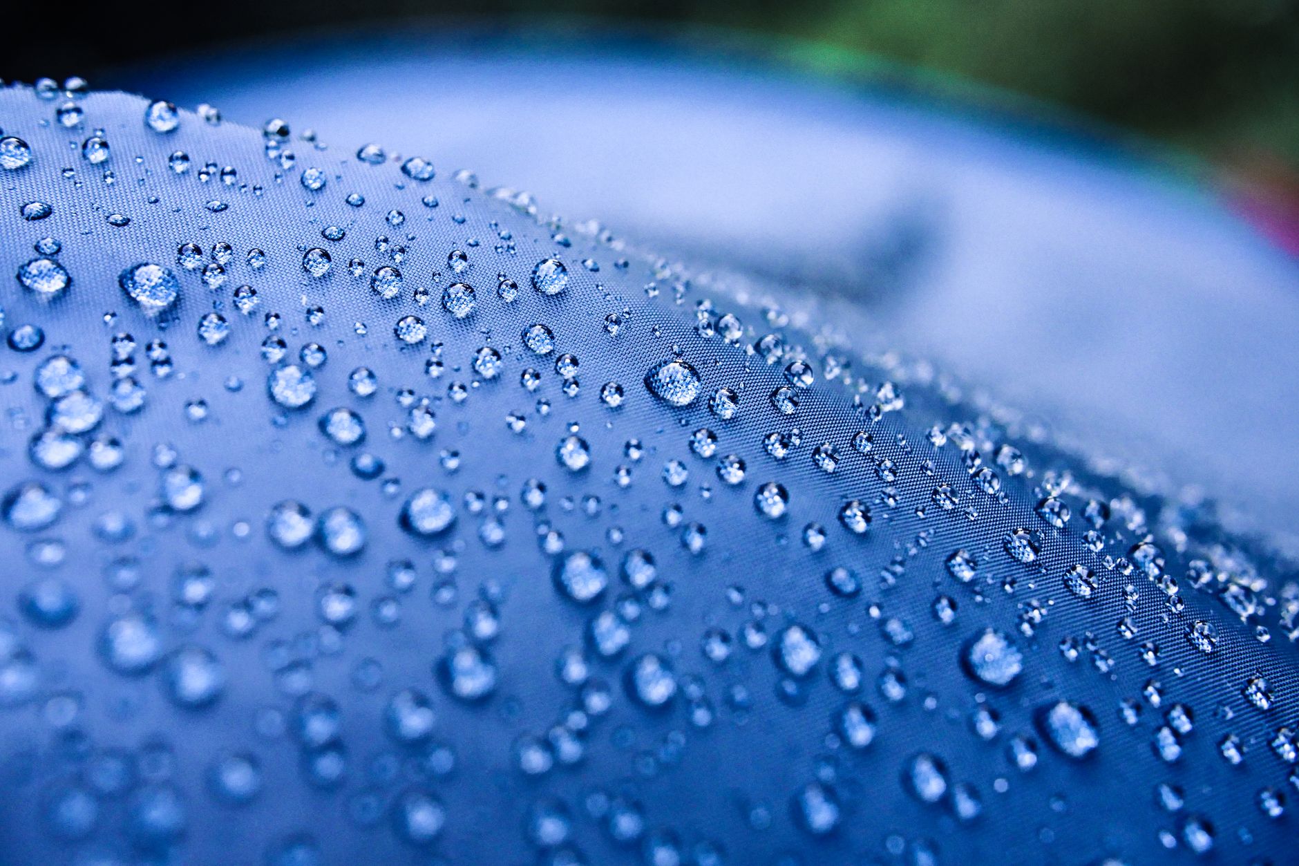 water droplets on a blue surface