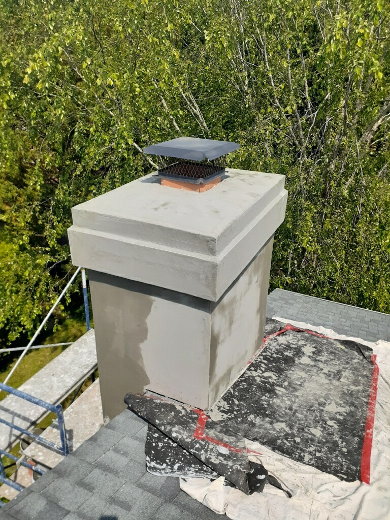 EIFS chimney chase repair in progress, base coat over cement board, Hampton Roads